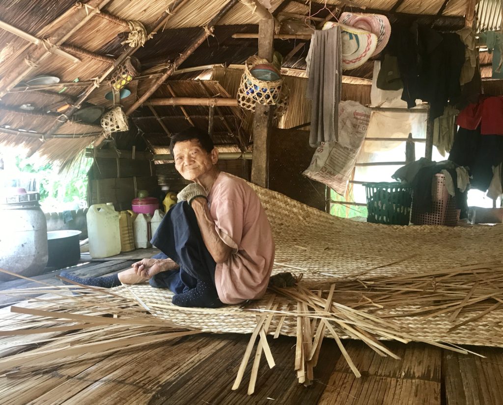 Old Man Weaving Bamboo